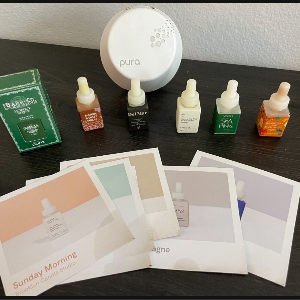 Pura plug in with scent vials and scratch cards